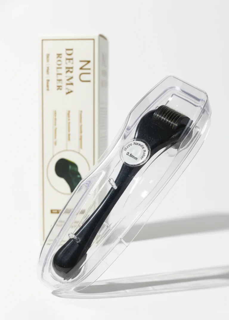 Black derma roller with clear packaging on a white background